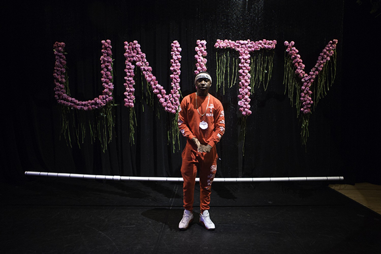 UNITY: Visions for Neighborhood Policing, June 2017. Participants in Barnard’s art diversion program designed an art game in which criminal legal professionals and community guests were invited to shared their thoughts and vision for local policing in New York City in exchange for a rose from the unity wall. Photo: Mansura Khanam. 