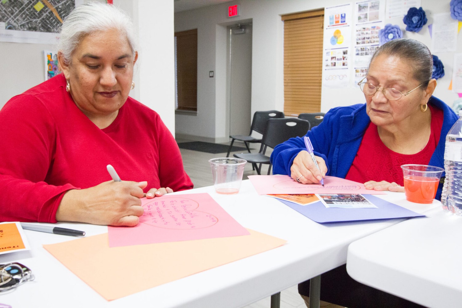 Taller De Permiso Welcome Event, 2018. To begin the project Taller de Permiso, Las Imaginistas met with community leaders who had been formative in developing the project concept and asked for their feedback before program kickoff. Held on Valentine’s day in 2018, the event included numerous activities that provided participants with opportunities to appreciate themselves, their community and their dreams for the future. Produced with the support of ArtPlace America’s National Creative Placemaking Fund. Image: Las Imaginistas.