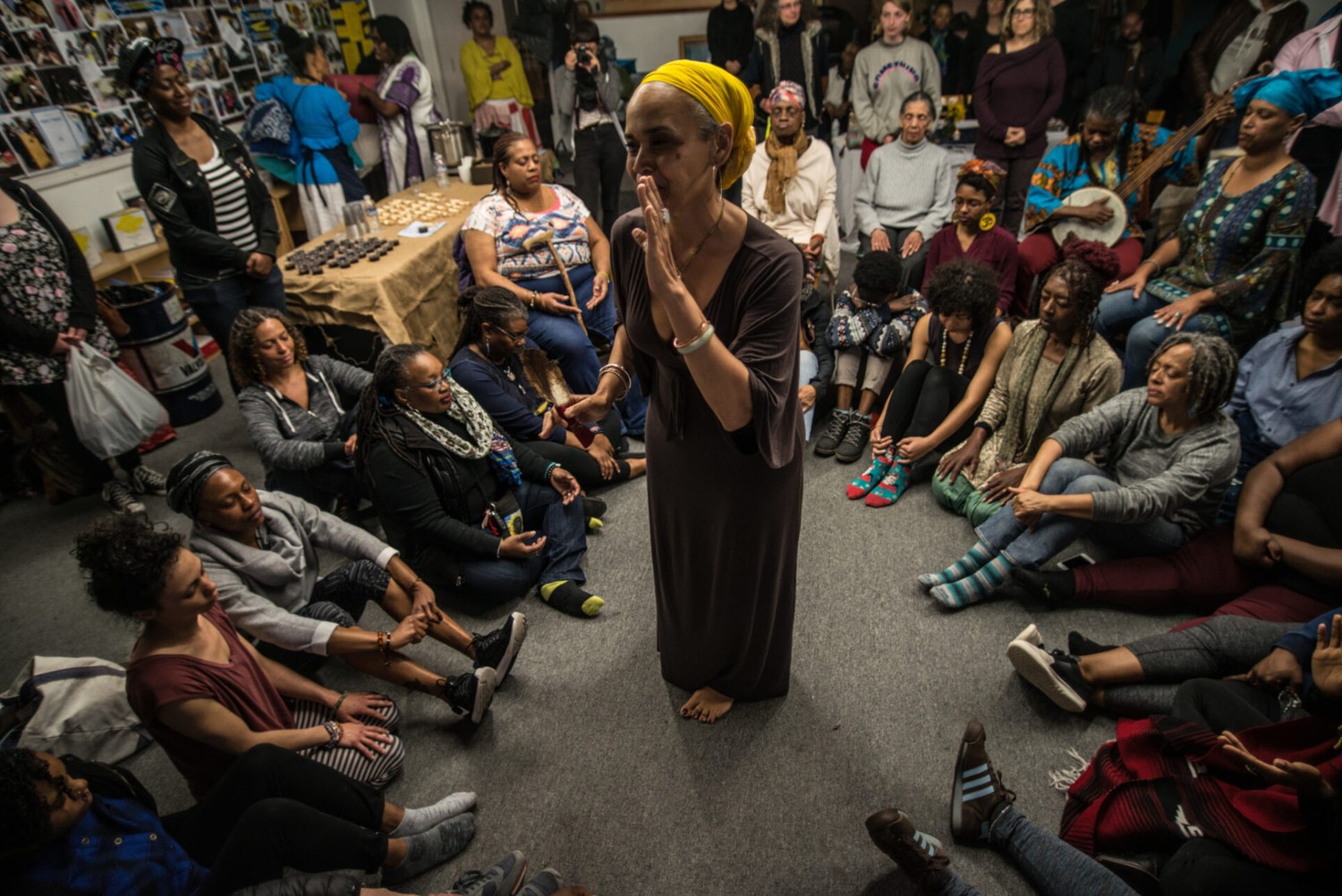 House/Full of Blackwomen Episode: "Black Womxn Dreaming," the blessing of the beds ceremony for a seven-day and night ritual of black women sleeping in a secret Oakland location. This ceremony invited the public to bring their pillows to be blessed, and to send the first wave of black women off to their ritual of rest, March 2017. Photo by Robbie Sweeny.