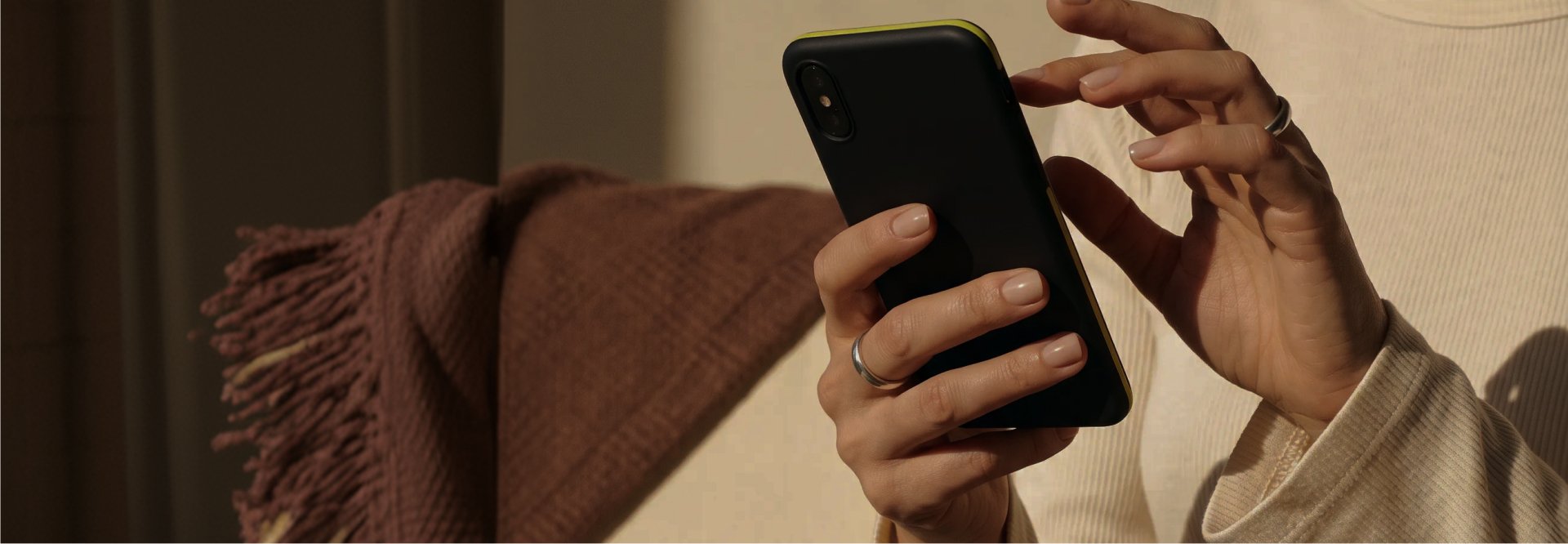 Hands holding a phone