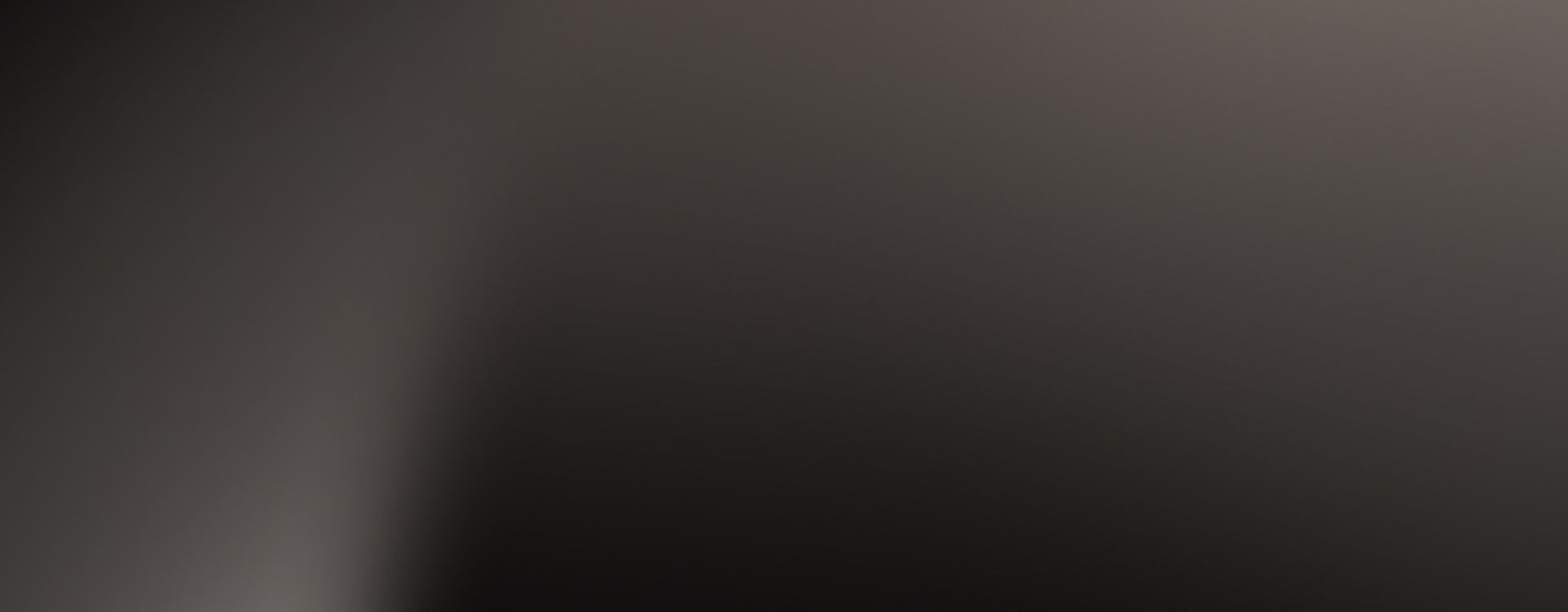 Soft grey gradient.