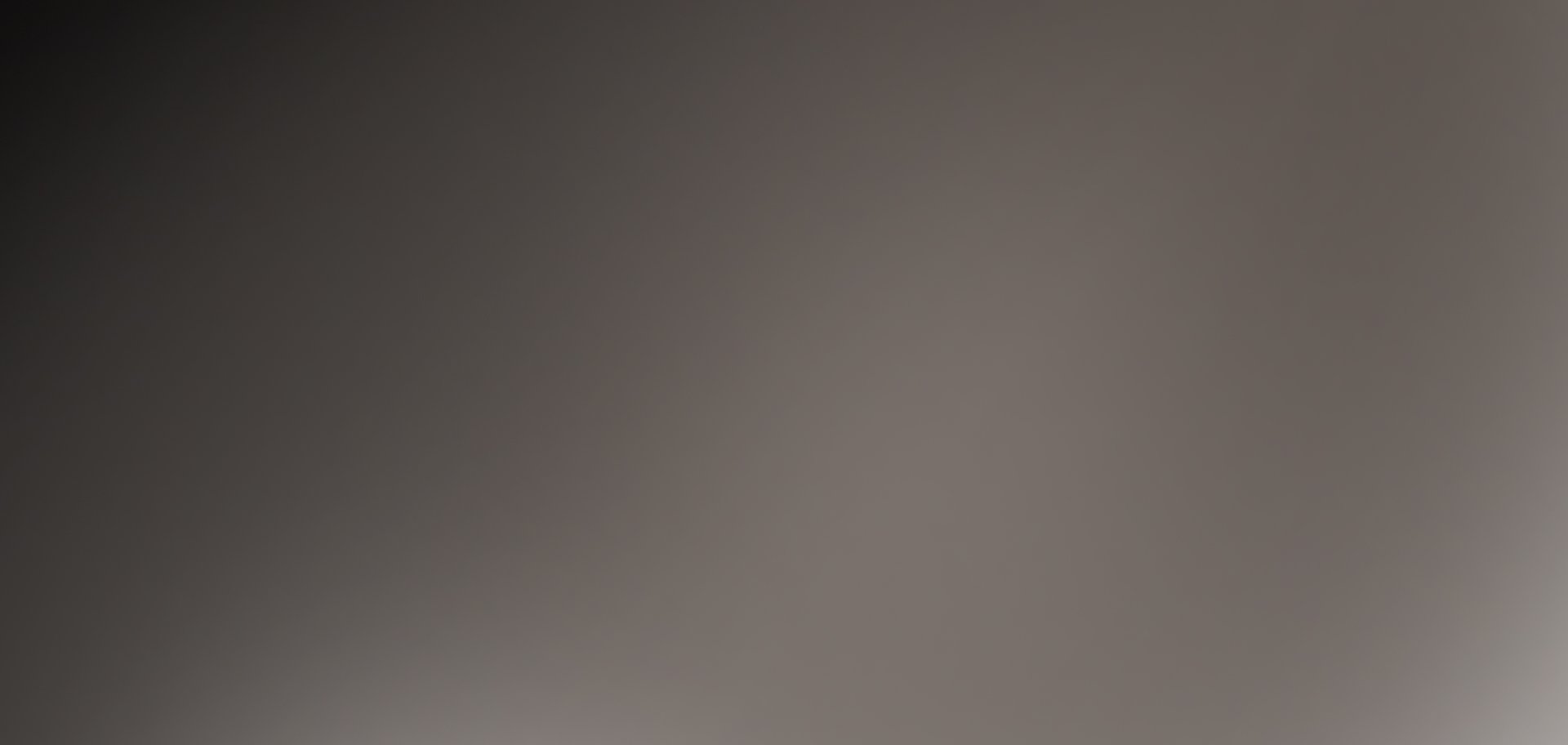 Soft grey gradient.