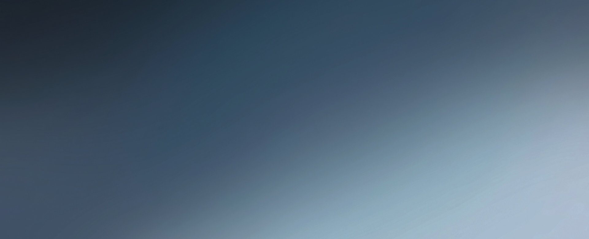 Smooth gradient from dark blue to light blue.