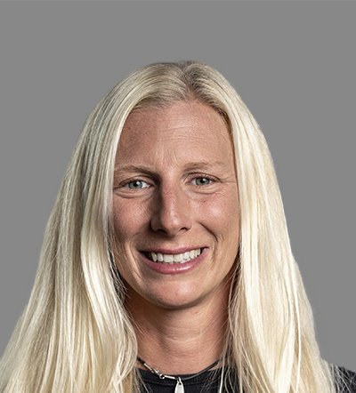 Smiling woman with long blonde hair.