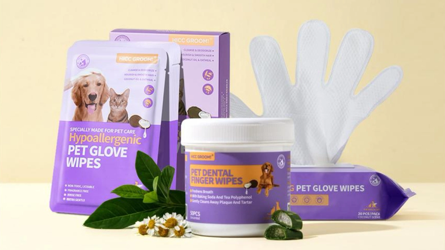 Purple pet grooming products including hypoallergenic pet glove wipes and pet dental finger wipes.