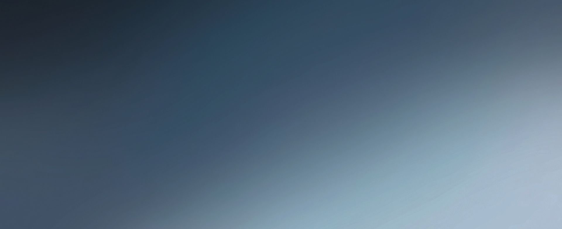 Smooth gradient from dark blue to light blue.