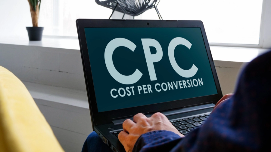 Laptop screen displaying 'CPC COST PER CONVERSION'.