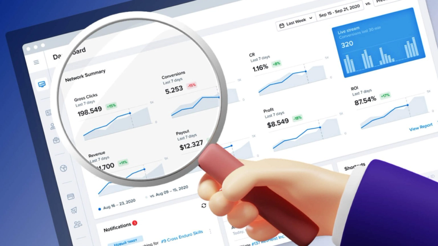 A stylized hand holds a magnifying glass over a digital dashboard displaying data metrics and graphs.