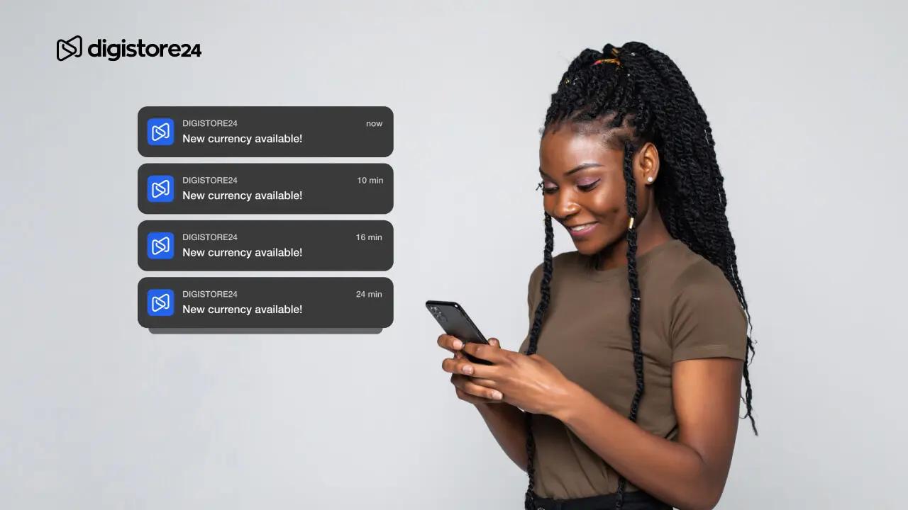 Smiling Black woman checking her phone with four floating "DIGISTORE24 New currency available!" notifications.