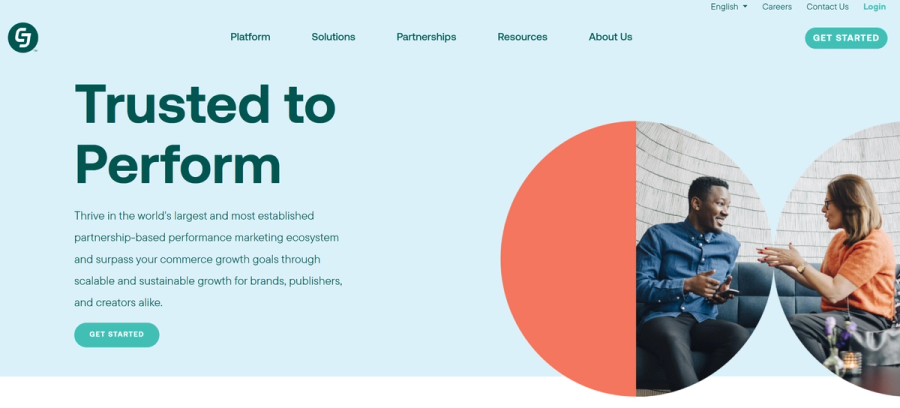 Screenshot of a marketing website featuring the headline "Trusted to Perform," a description of a performance marketing ecosystem, and an image of two people talking.