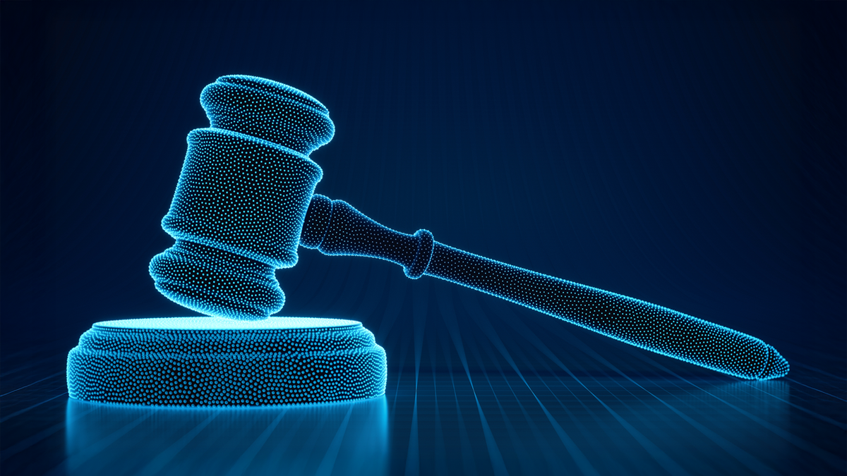 Glowing blue particle-effect gavel and sounding block.