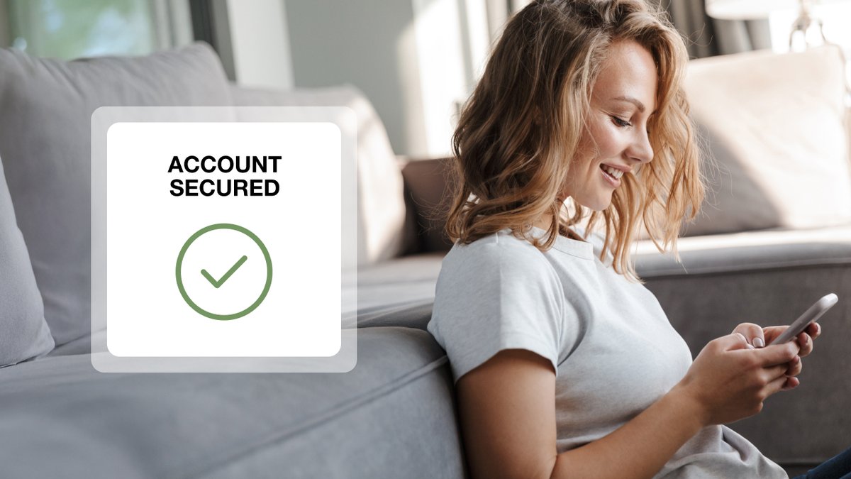 Smiling woman using phone with an "ACCOUNT SECURED" overlay and checkmark.