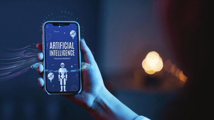A hand holds a smartphone displaying "ARTIFICIAL INTELLIGENCE Personal assistant" with a robot icon and digital graphics.