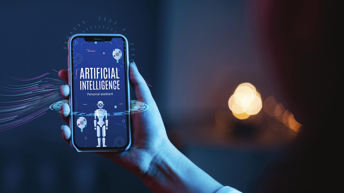 A hand holds a smartphone displaying "ARTIFICIAL INTELLIGENCE Personal assistant" with a robot icon and digital graphics.