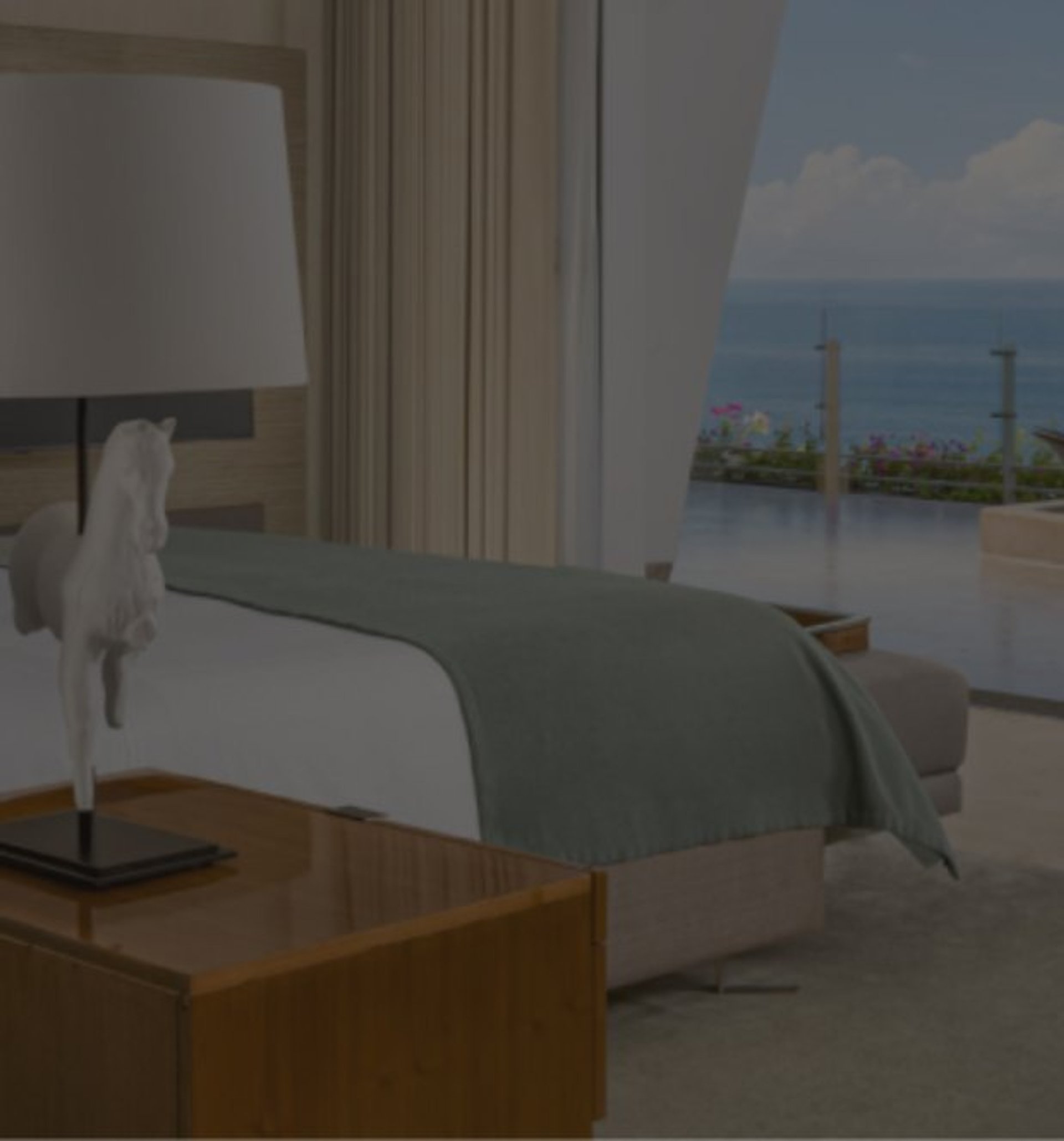 Luxurious bedroom with ocean view and a private balcony featuring a plunge pool.