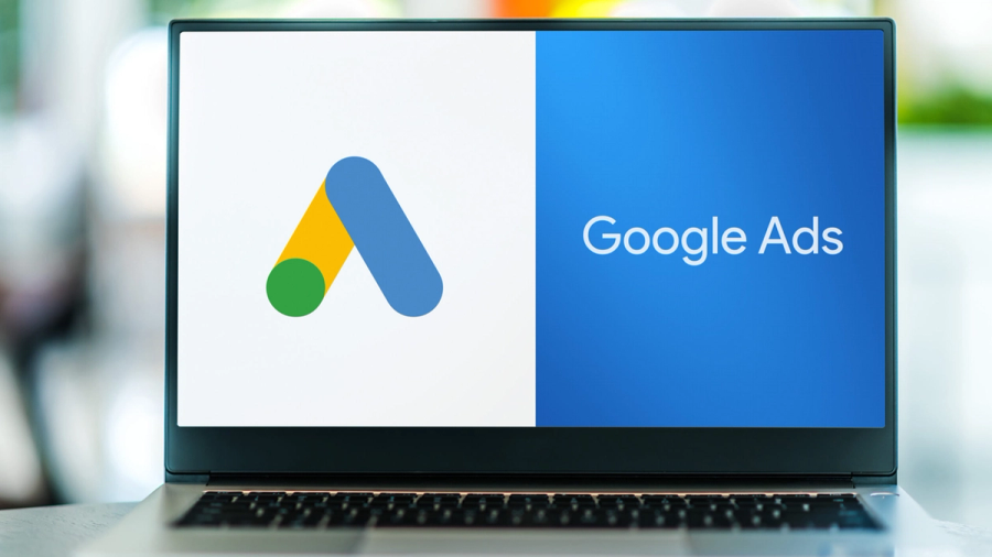 Laptop screen displaying the Google Ads logo and name.