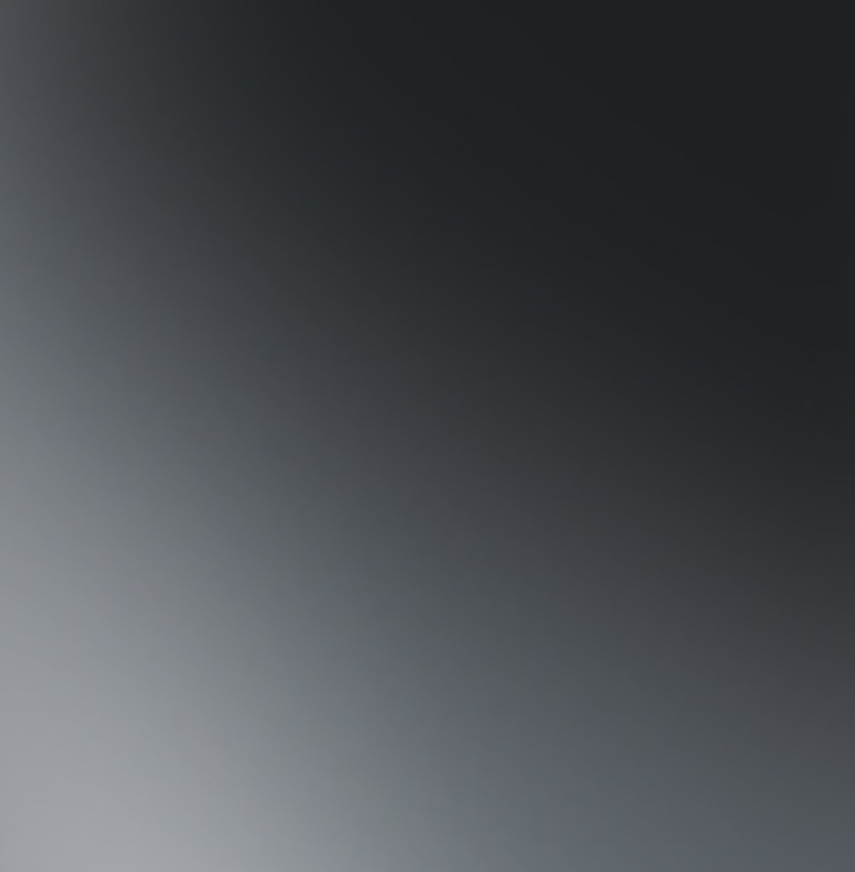 Gradient from dark grey to light grey.