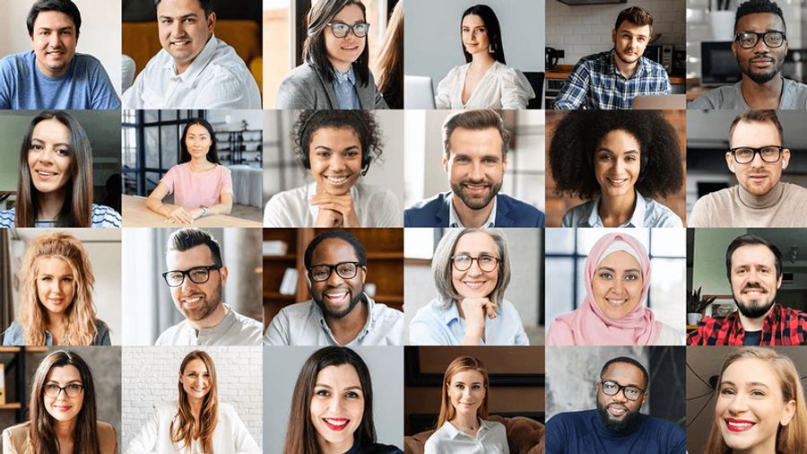 25 smiling, diverse people in a video conference grid.