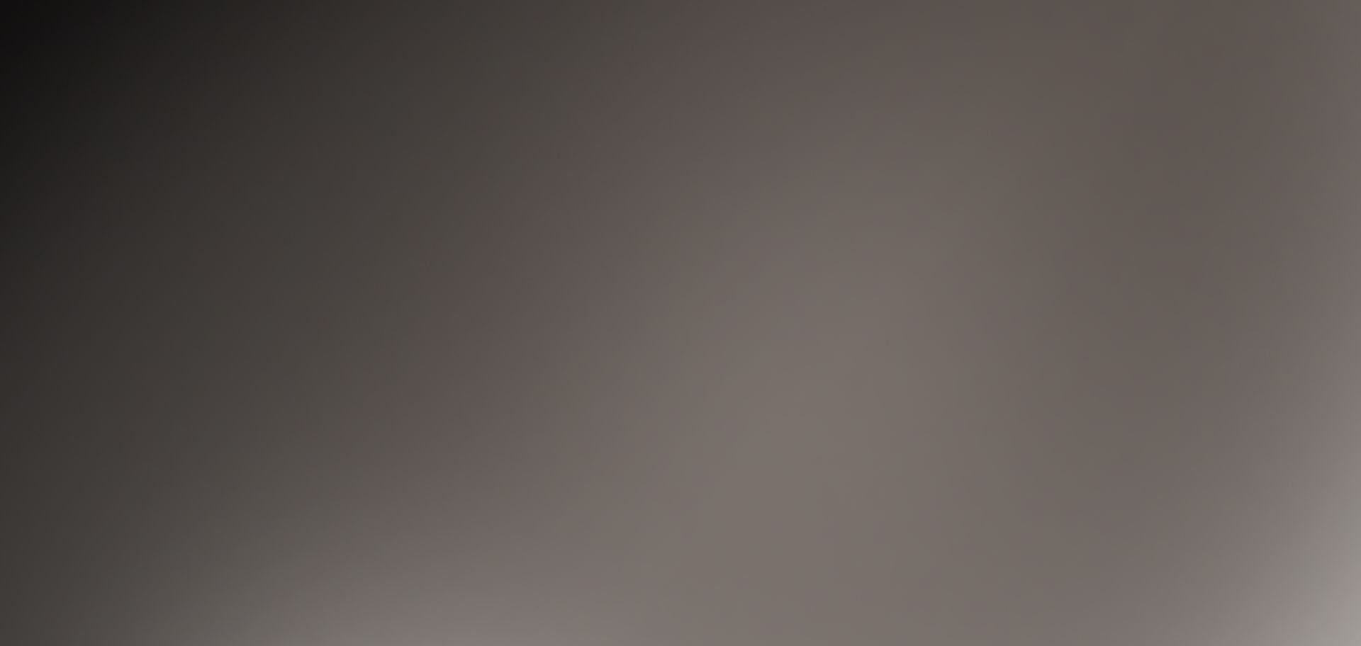 Soft grey gradient.