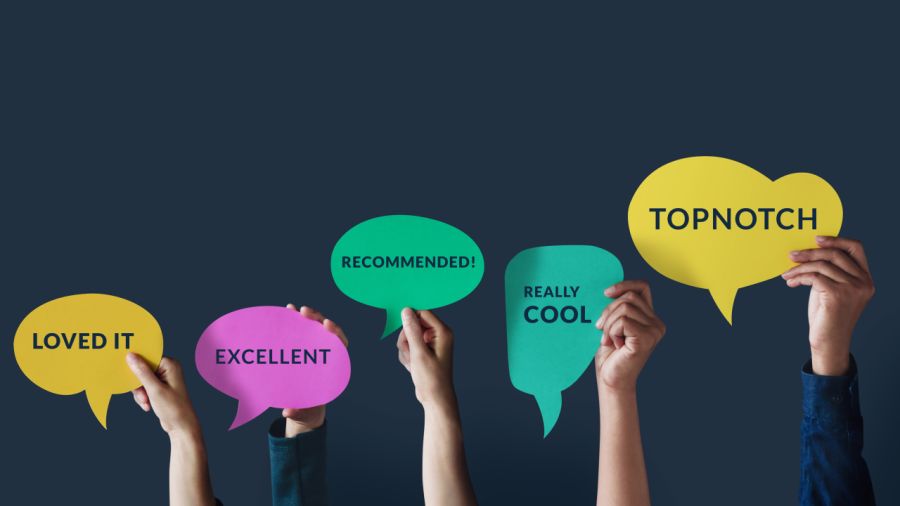 Hands hold five colorful speech bubbles with positive feedback: "LOVED IT", "EXCELLENT", "RECOMMENDED!", "REALLY COOL", "TOPNOTCH".