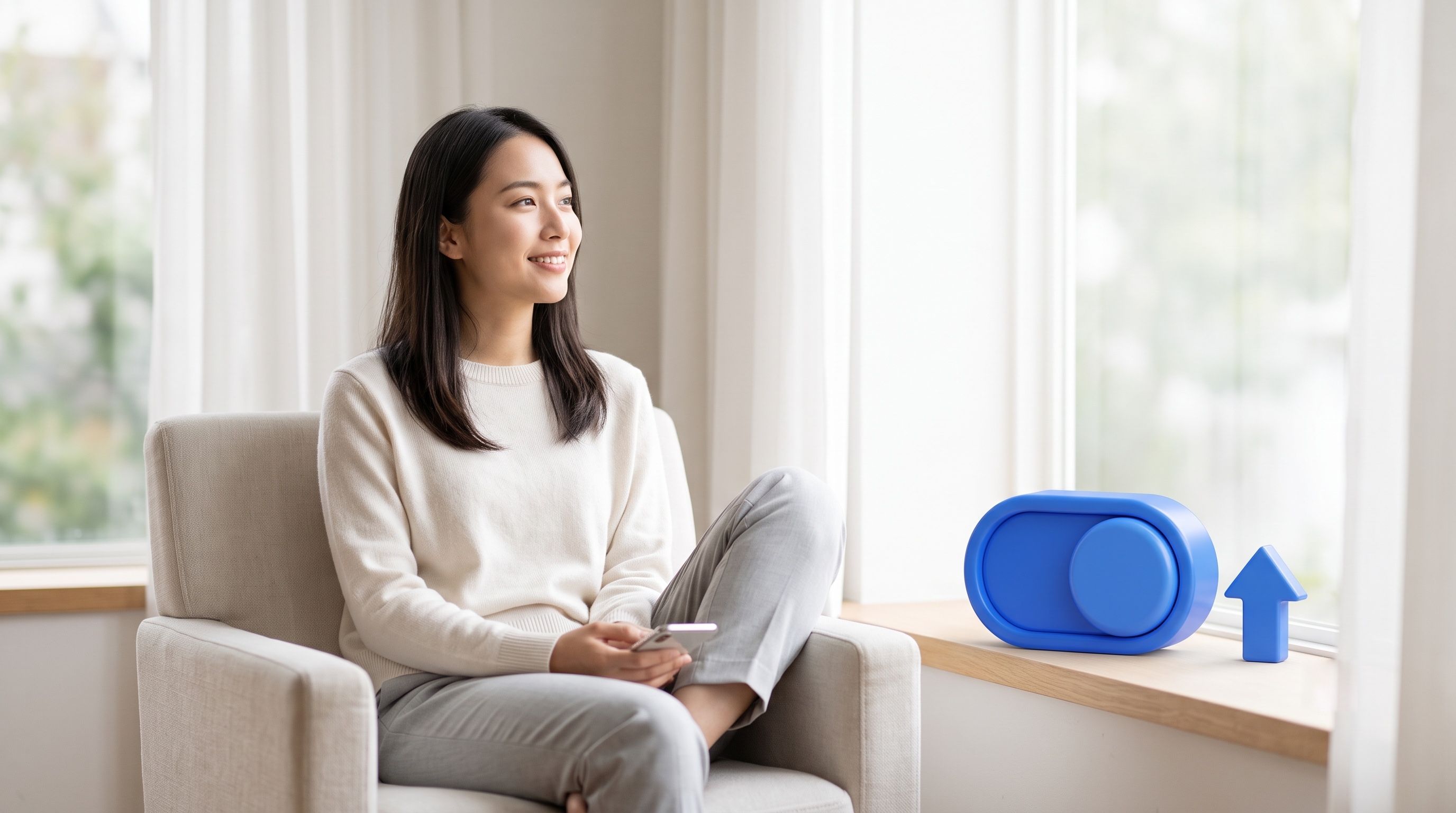 A smiling woman sits in an armchair looking out a window, holding a phone. On the windowsill are a blue 3D toggle switch and an upward-pointing arrow.