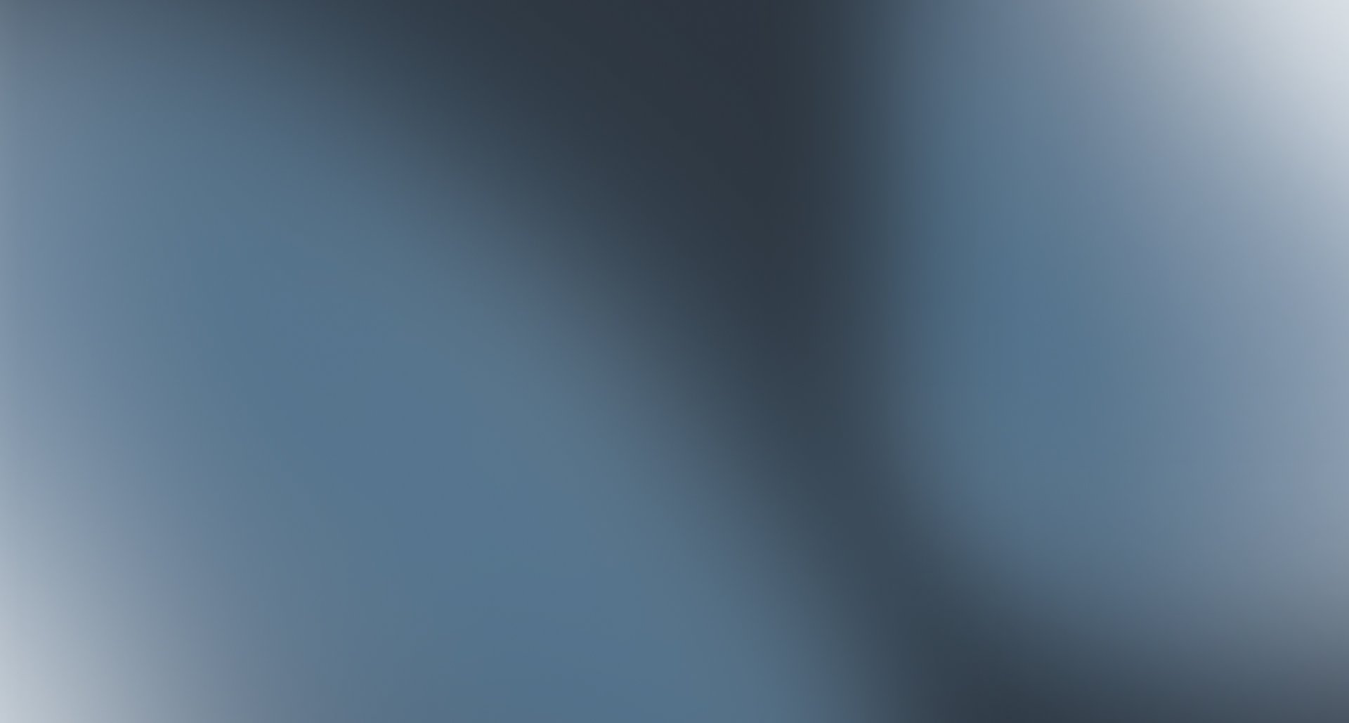 Abstract blue-gray gradient background.