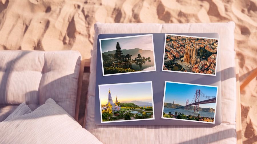 Four travel photos of landmarks displayed on a tray on a beach lounge chair.