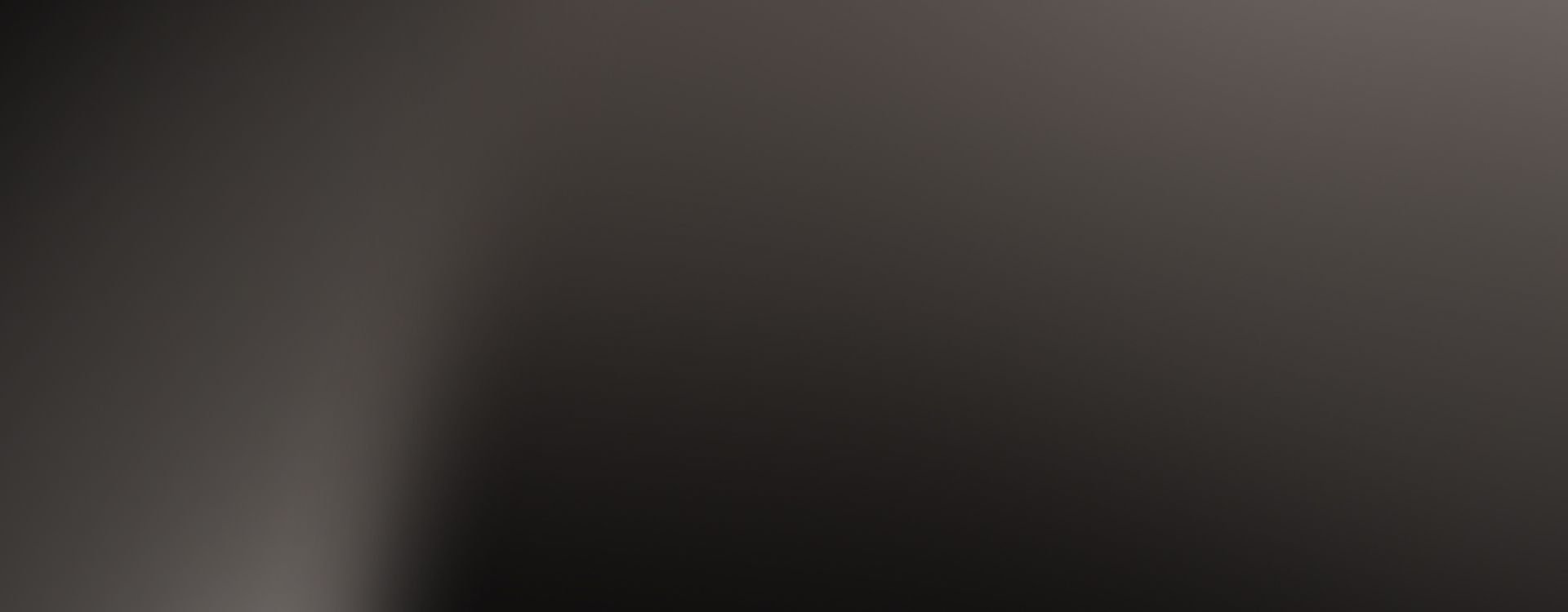 Soft grey gradient.