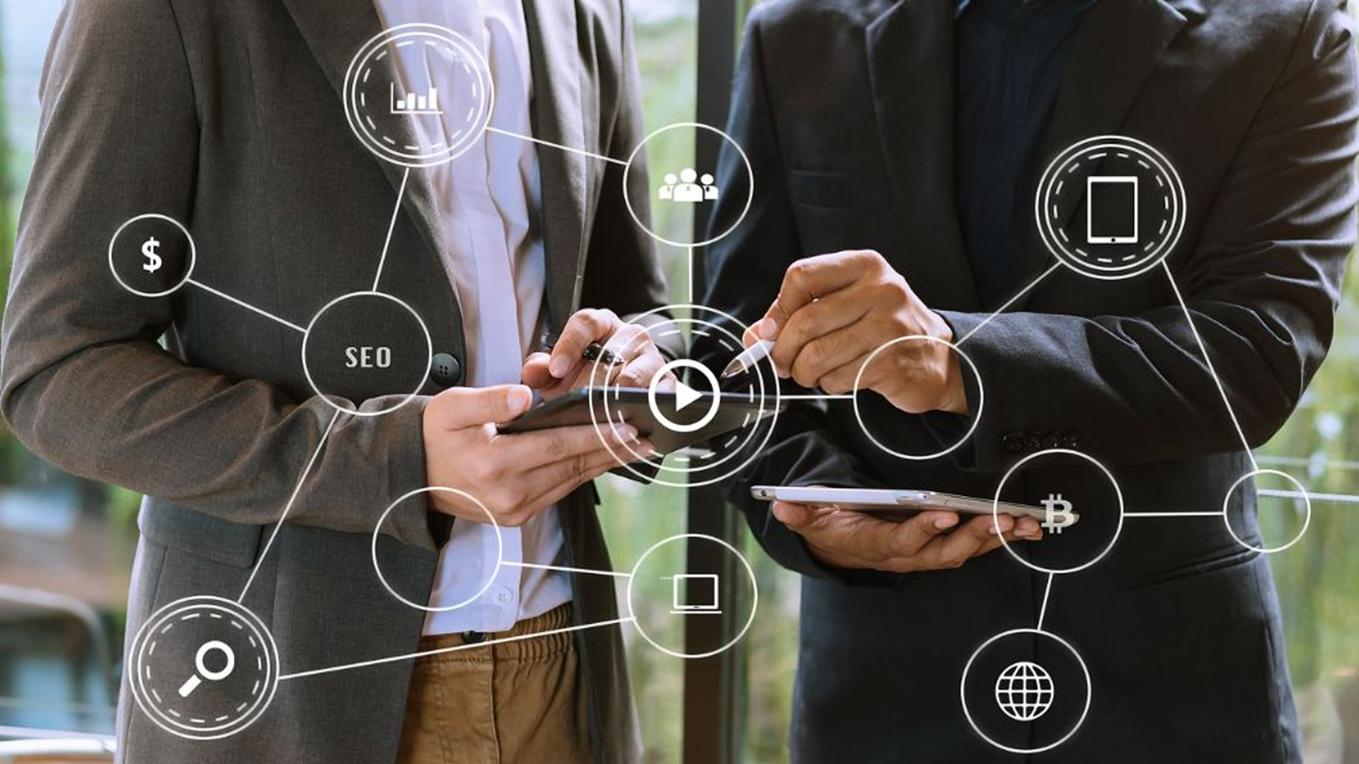 Two people using tablets, connected by a network of digital marketing and business icons including SEO and video.