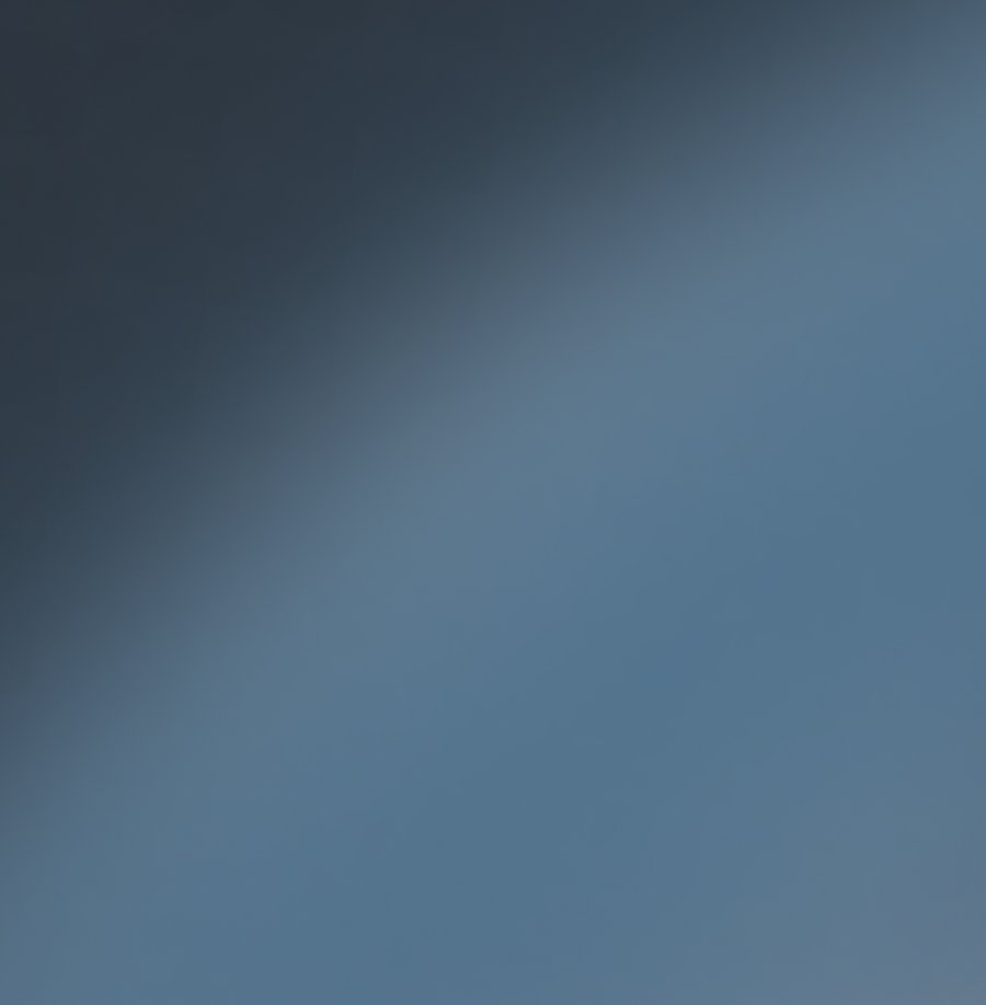 A blue-gray gradient background.