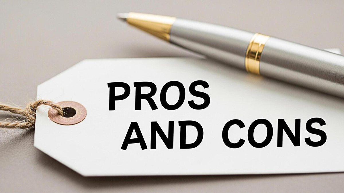White tag with "PROS AND CONS" written on it, with a pen in the background.