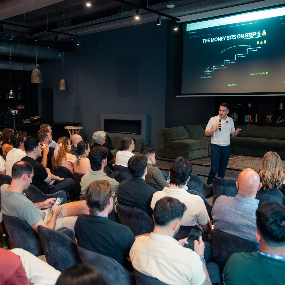 Marco speaking to a mastermind crowd