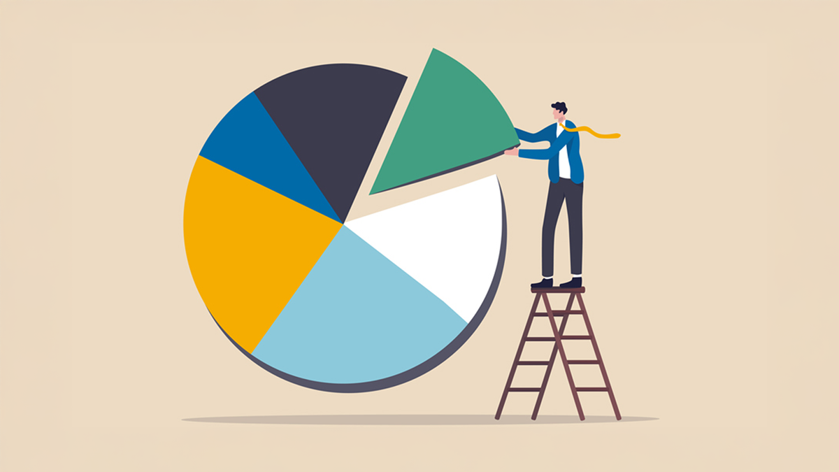 A man on a ladder places the final piece into a colorful pie chart.
