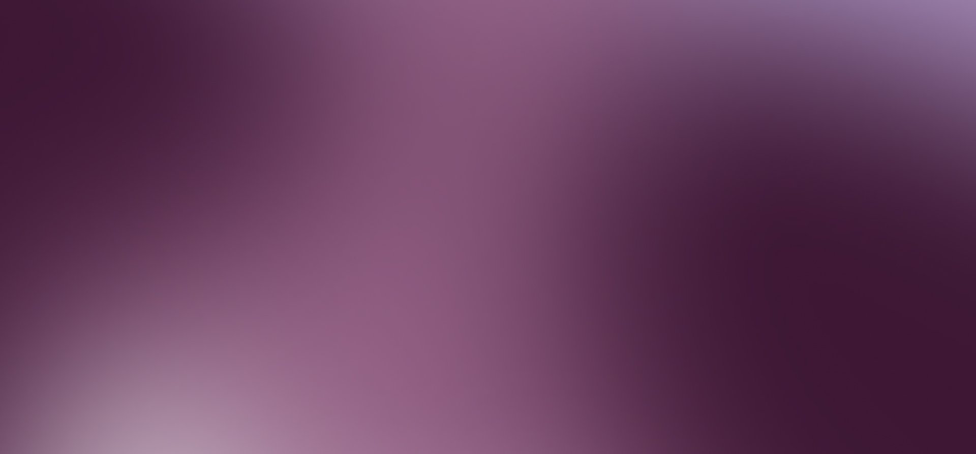 Blurred purple and plum gradient background.