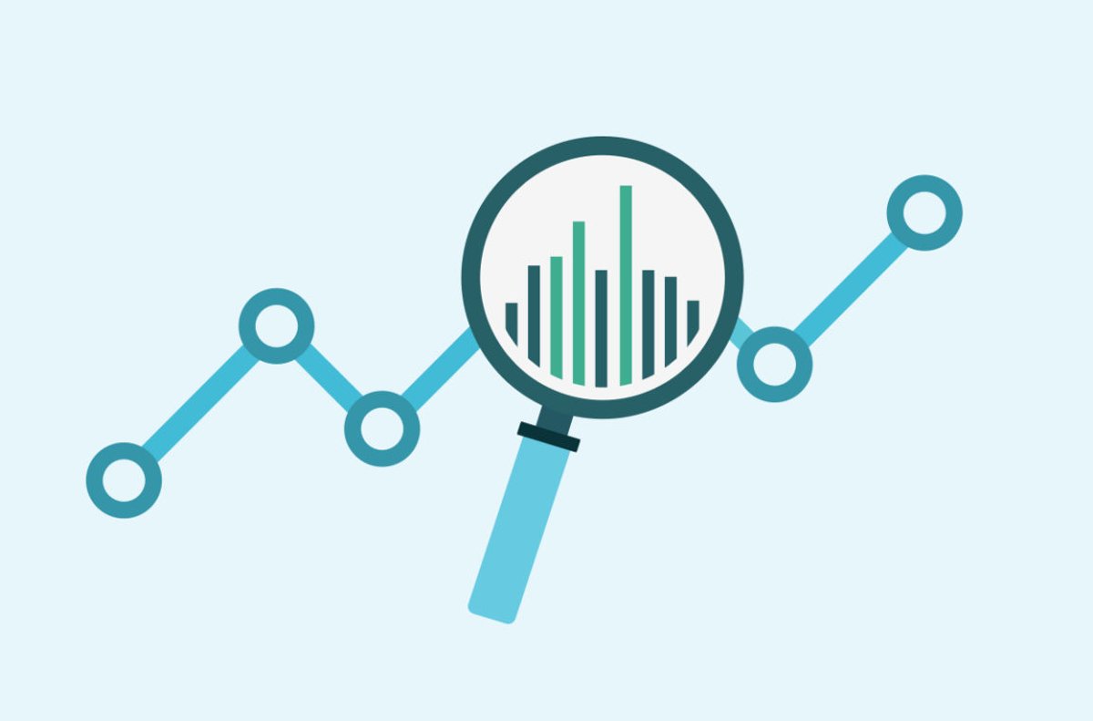 Magnifying glass analyzing a line graph, showing a bar chart.