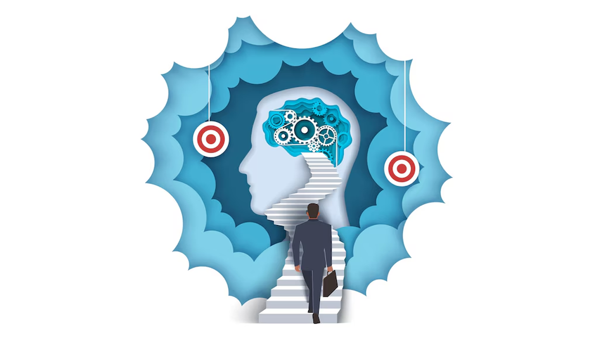A businessman climbs stairs towards a geared brain inside a head silhouette, framed by layered blue clouds and targets.
