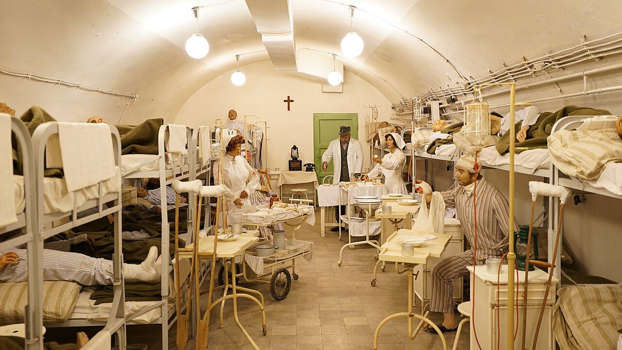 Recreated ward with hospital beds inside the Hospital in the Rock museum