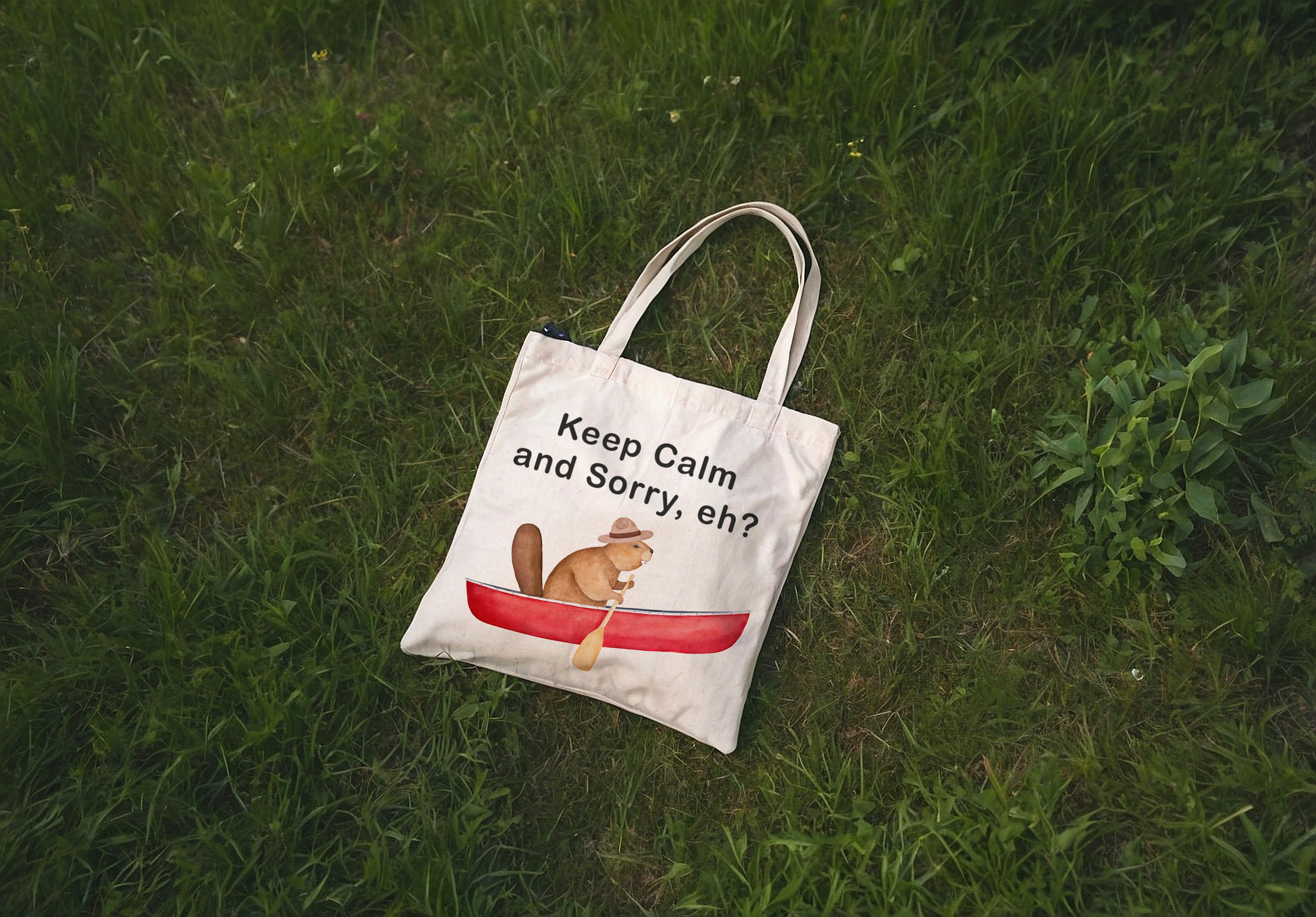 Printed tote bag for summer with an illustration that reads "Keep Calm and Sorry, eh?"