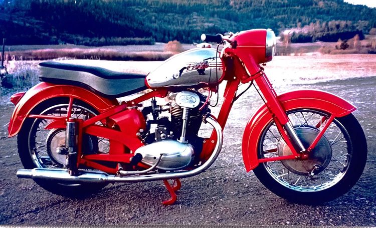 Classic blue Suzuki motorcycle