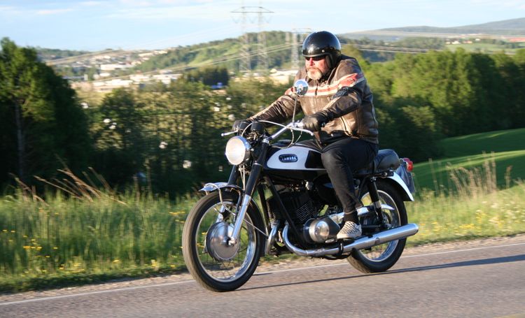 Classic blue Suzuki motorcycle
