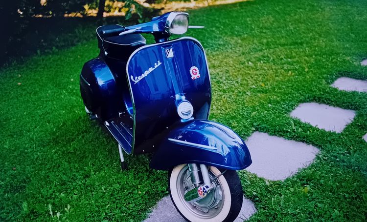 Classic blue Suzuki motorcycle