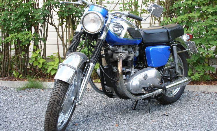 Classic blue Suzuki motorcycle