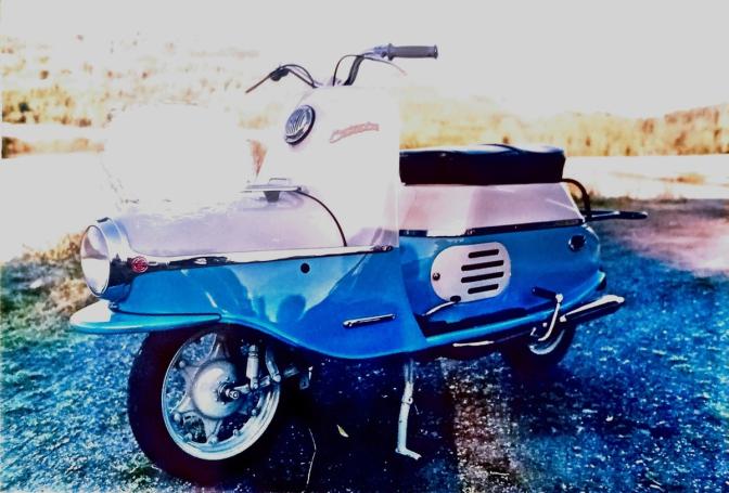 Classic blue Suzuki motorcycle