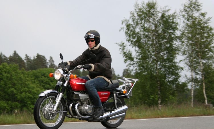 Classic blue Suzuki motorcycle