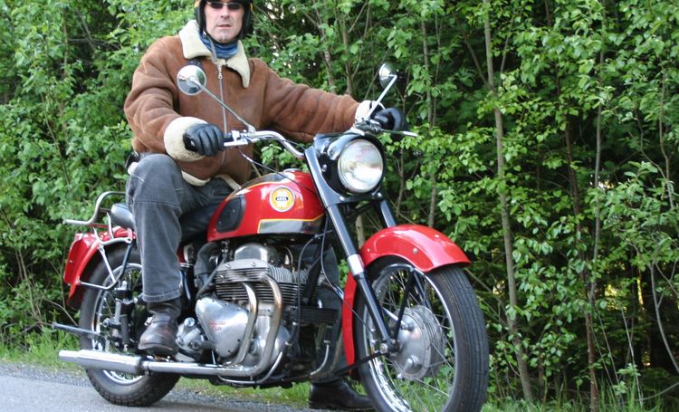 Classic blue Suzuki motorcycle
