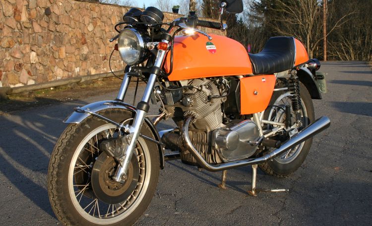 Classic blue Suzuki motorcycle