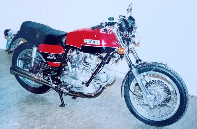 Classic blue Suzuki motorcycle