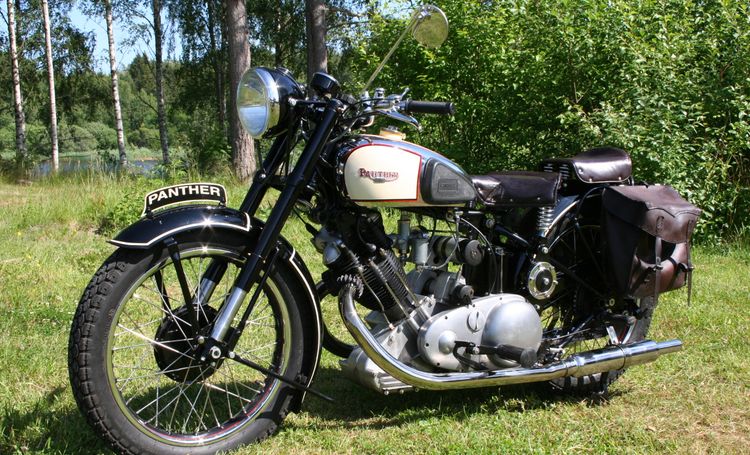 Classic blue Suzuki motorcycle