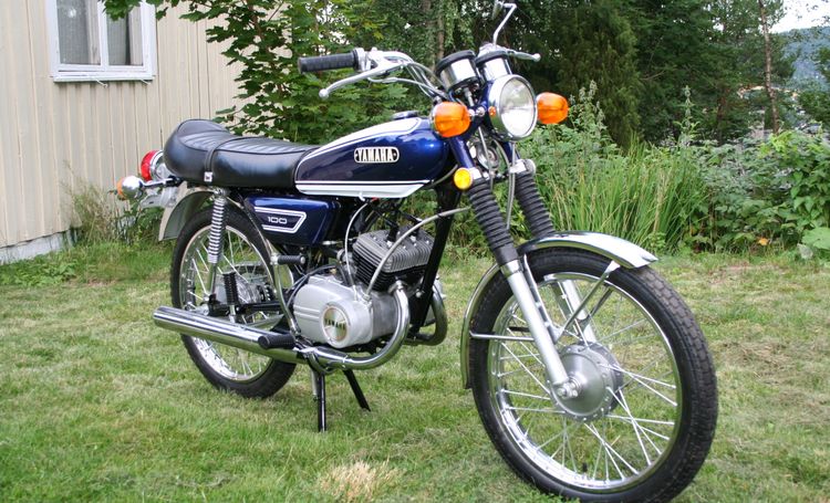 Classic blue Suzuki motorcycle