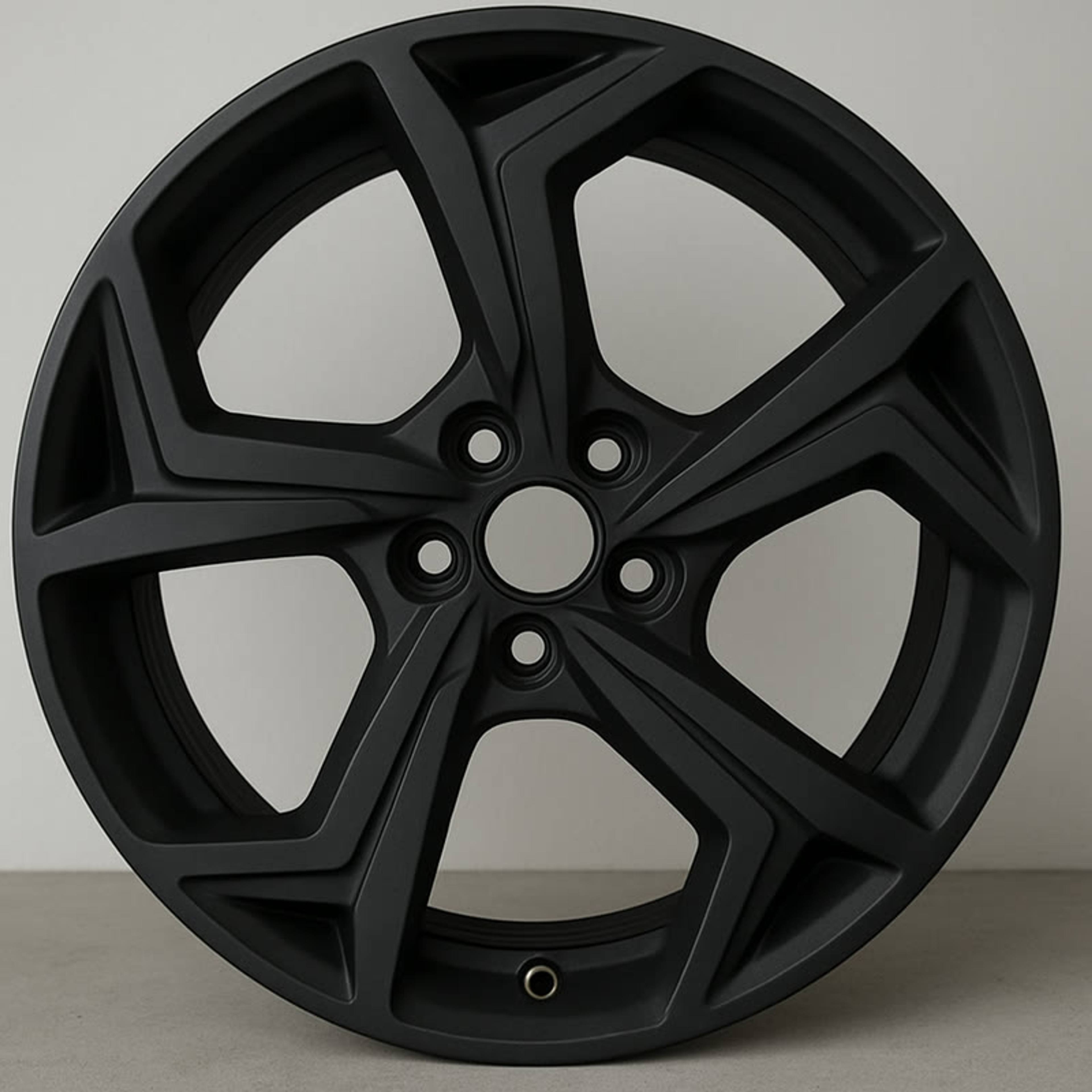 Dezelfde velg mat zwart gepoedercoat, na behandeling